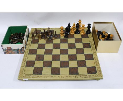 Composite chessboard, 38cm, together with a set of wooden chess pieces, tallest piece 7cm, and a set of metal chess pieces, t