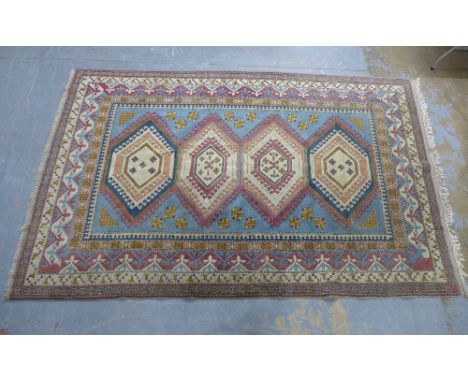 A Turkish Kars style wool carpet, 343 x 220cm