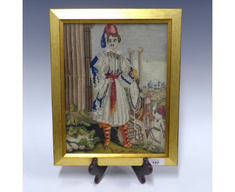 An embroidered tapestry panel of a mediterranean soldier, framed under glass, 23 x 30cm (labelled verso 1835 - 40)