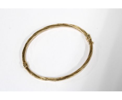 9ct gold bangle with twisted design, stamped 375