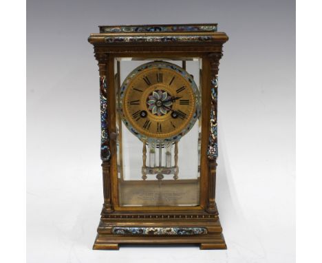 French Brass and champleve enamel four glass panelled mantle clock, with presentation plaque for 1904, brass movement strikin