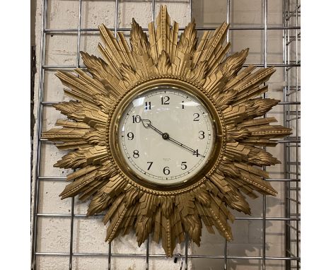 BATTERY OPERATED SUNBURST CLOCK 48CMS (DIAM)
