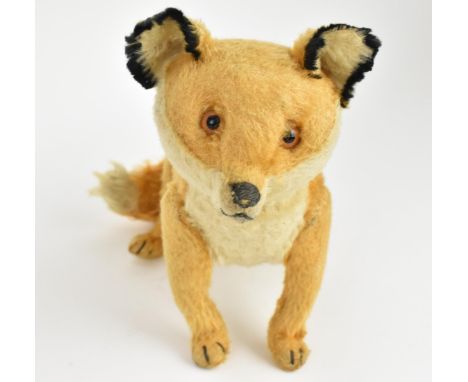 A vintage Steiff style fox soft toy, approx 38cm long tail to nose Location: