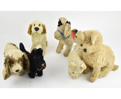 A group of six vintage soft toys to include a possibly Steiff 'Tabby' kitten/cat, Chad Valley dog, Spaniel, donkey and others