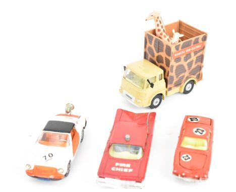 Corgi Toys - a group of four Corgi model vehicles to include 'R'JKSPOLITIE' Porsche Targa 9115, Chevrolet Impala 'Fire Chief'