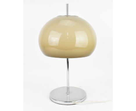 A mid century Guzzini style table lamp, circa 1960 - 1970, with a mushroom shade, on a chrome stem and circular base 