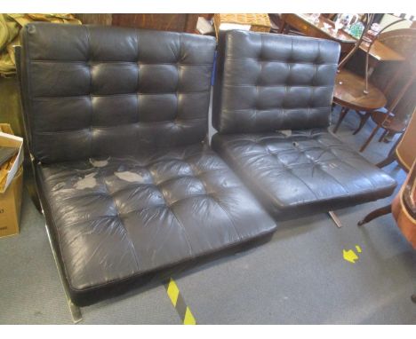 A pair of vintage Barcelona chairs having chrome support A/F 
