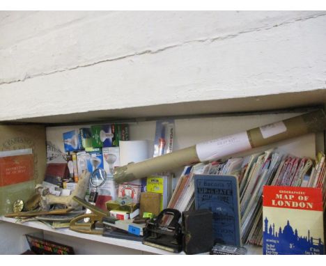 Vintage maps, desk related items, Halogen and other boxed lightbulbs, Retro postcards, a Routledge Diamond Dictionary in mini