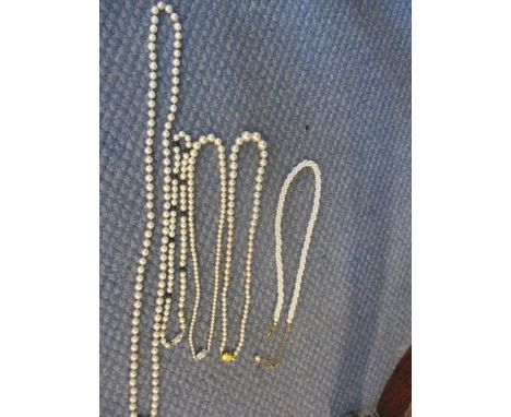Five vintage pearl necklaces to include seed pearls, some with silver clasps 