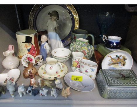 A quantity of mid to late 20th century ceramics to include a musical ceramic beer tankard, Wade collectables, a Nao figure an