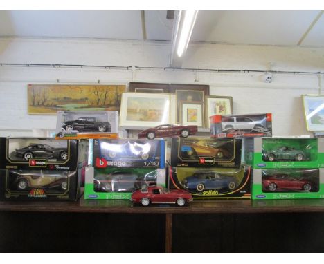 A group of twelve boxed and unboxed Nex models, Solido, Burago and Maisto diecast model cars to include a Burago Jaguar 88100