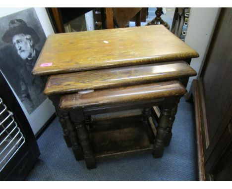 A mixed lot of small furniture to include a Guildoak nest of three oak tables, an oak coffee table, walnut veneered gypsy tab