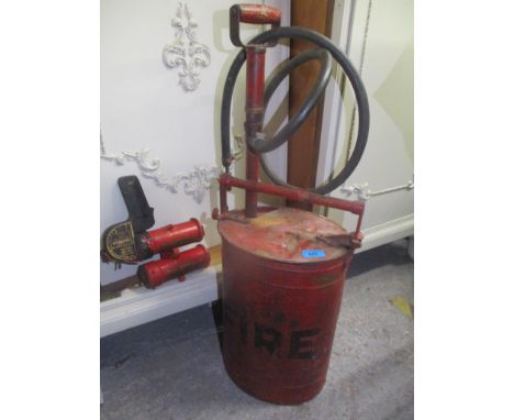 A vintage Nesthill hand pumped fire extinguisher with a hand held Antifyre pistols with two unused extinguishers