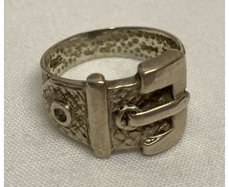 A vintage silver buckle dress ring with diamond shaped decoration.  Hallmarks to inside of band.  Ring size W. Approx. 7.1g.