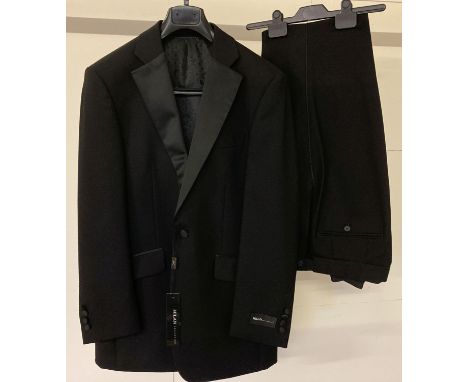 A brand new with original tags Milan Collection men's Tuxedo dinner suit.  Single button fully lined jacket in 38 inch chest 