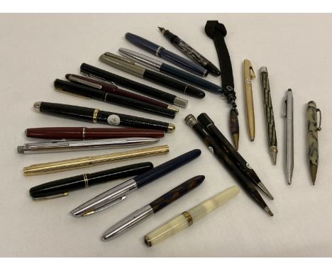 A collection of assorted vintage pens and propelling pencils.  To include: Parker, Platignum, Waterman's, Sheaffer and Daily 