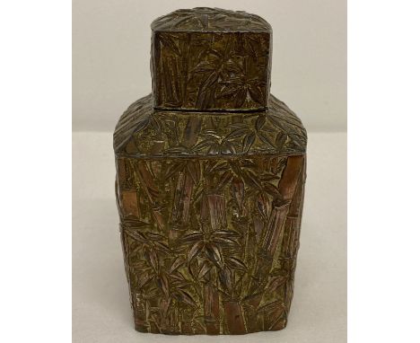 A Chinese metal 4 sided tea caddy with bamboo decoration.   Approx. 12.5cm tall.