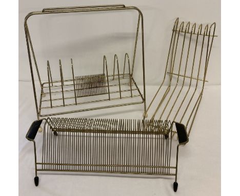 3 vintage metal record storage racks all with gold tone finish.  All store both 33 and 45 rpm records. 