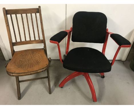 A vintage wooden folding chair with cut out detail to seat together with a vintage metal and fabric  swivel chair, height adj