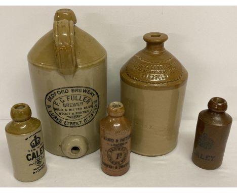 2 vintage advertising stoneware bottles together with 3 smaller stoneware ginger beer bottles.  F.C. Fuller, Bedford Brewery 