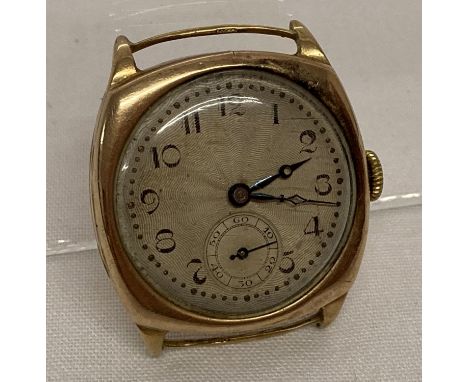 An early 20th century 9ct gold cased watch with engine turned face, in working order.  Blue steel hands and subsidiary second
