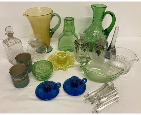A collection of vintage glass ware. To include blue candlesticks and green Art Decco style carafe.  Together with a small yel