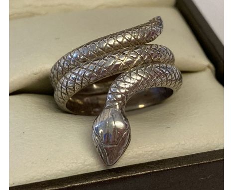 A silver serpent ring with scale decoration throughout.  Size K½.  Approx. 5.7g.