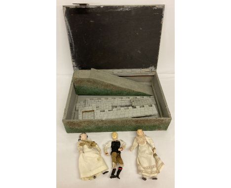 A wooden toy castle together with 3 vintage cloth bodied dolls with ceramic head, hands &amp; feet.  Largest doll approx. 20c