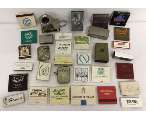 A small box of vintage advertising matches, match box holders and vesta cases.  To include Oxo, House Of Commons, Planet Holl