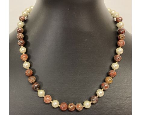 A 16" Swarovski pearl and brecciated jasper beaded necklace with 9ct gold clasp &amp; spacer beads.  
