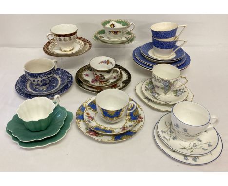 A box of assorted vintage ceramic trio's.  To include: Royal Stafford "Morning Glory", Wedgwood "Florida" and Grosvenor China