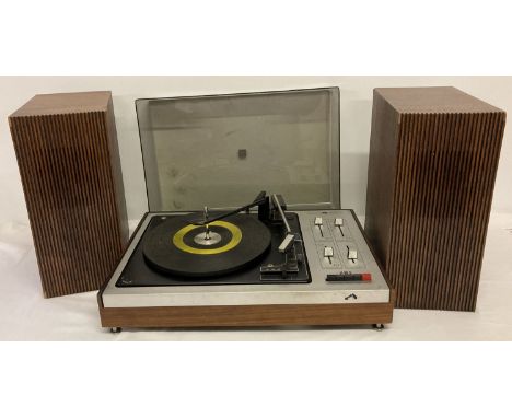 A vintage HMV 2452 record turntable with original wooden cased speakers.  Needs attention. 