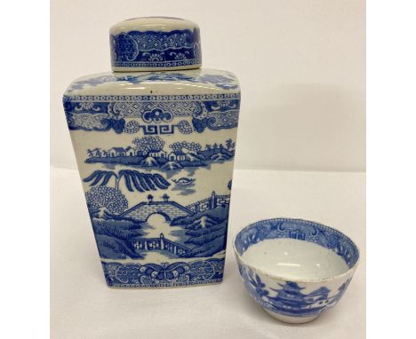A vintage Ringtons ceramic lidded tea jar with blue and white Willow pattern design.  Together with a ceramic tea bowl also w