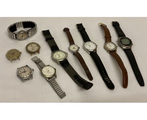 A quantity of assorted vintage wrist watches, with and without straps.  To include: Ruhla, Lucerne, Ricardo, Timex and Basis.