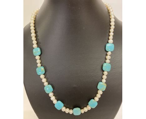 A 20" turquoise and fresh water pearl beaded necklace with pearl set clasp.  