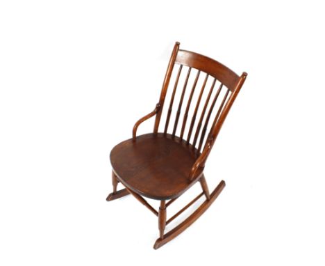 A bentwood stick back rocking chair