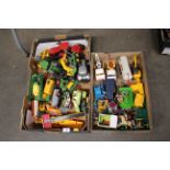 A collection of Britains, Siku, Ertl and other die-cast play worn model agricultural vehicles,