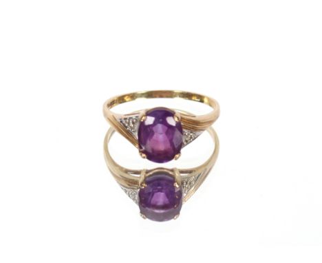 A 9ct gold amethyst and white stone set ring, weight approx. 2.5g
