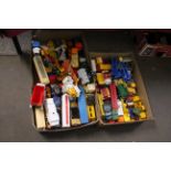 A large collection of various unboxed die-cast model vehicles to include car transporters, petrol