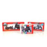 A Britains Valmet logging tractor and trailer, No.9627; a Britains Valmet tractor and snow plough,