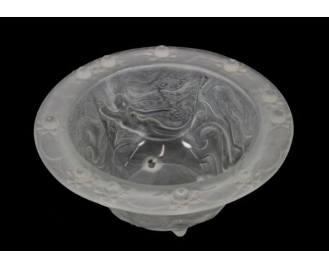 A Lalique style opaque glass bowl decorated swimming mermaids and raised flower heads to the fold over rim, 33cm dia. x 14cm 