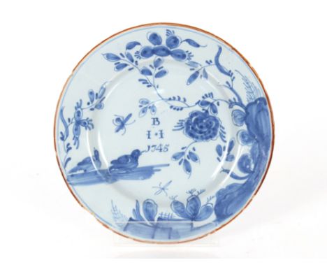 A rare set of five 18th Century Bristol Delftware plates, each painted with two ducks and a peony flowering from rocks and in