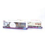 A Corgi CC13406 MAN TGA XXL box trailer for Saints Transport and a Corgi CC13219 DAF XF Space Cab