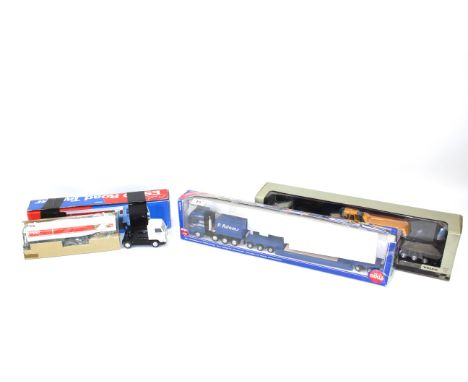 A Siku 3931 1:50 heavy haulage low loader transport set; a Motorart 1:50 Volvo 660 low body and Volvo A25C dumper truck; and 