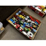 A large collection of unboxed model cars, mostly play worn