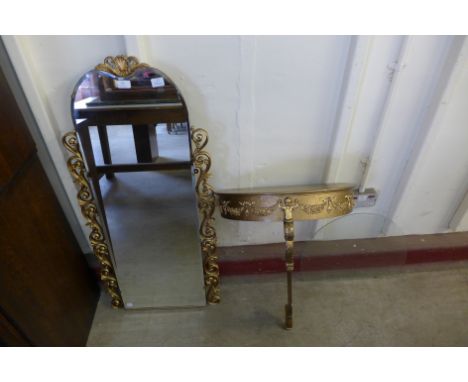 A gilt console table and mirror