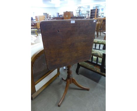 A George III mahogany tilt top tripod table