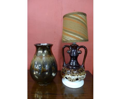 A West German glazed table lamp and a Poole vase