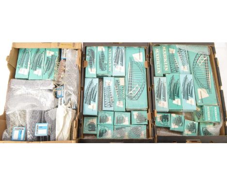 A large Collection of Marklin Bridges Viaducts and Supports (3 boxes), including two boxed ref 7163 'bowstring' bridges and t