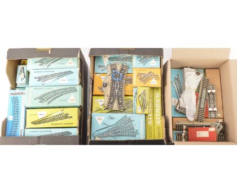 A large Collection of Marklin HO Gauge 3-rail (stud) Track and Power Units (qty), the majority in original boxes and with ele
